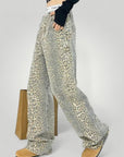 Hohe Taille Flared Jeans mit Leopardendruck - Aurivio Mode