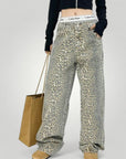 Hohe Taille Flared Jeans mit Leopardendruck - Aurivio Mode
